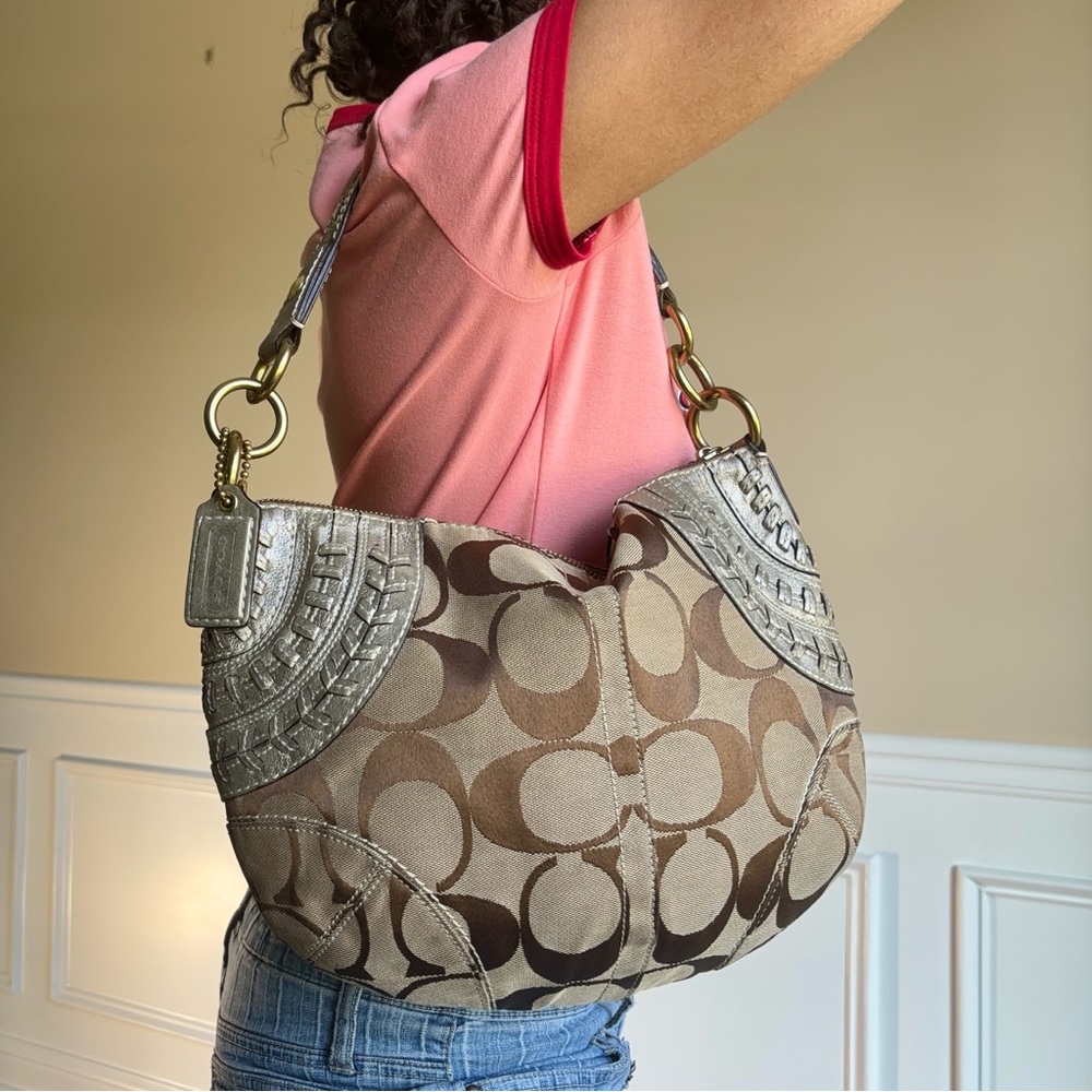 coach hobo bag with braided stitch gold details